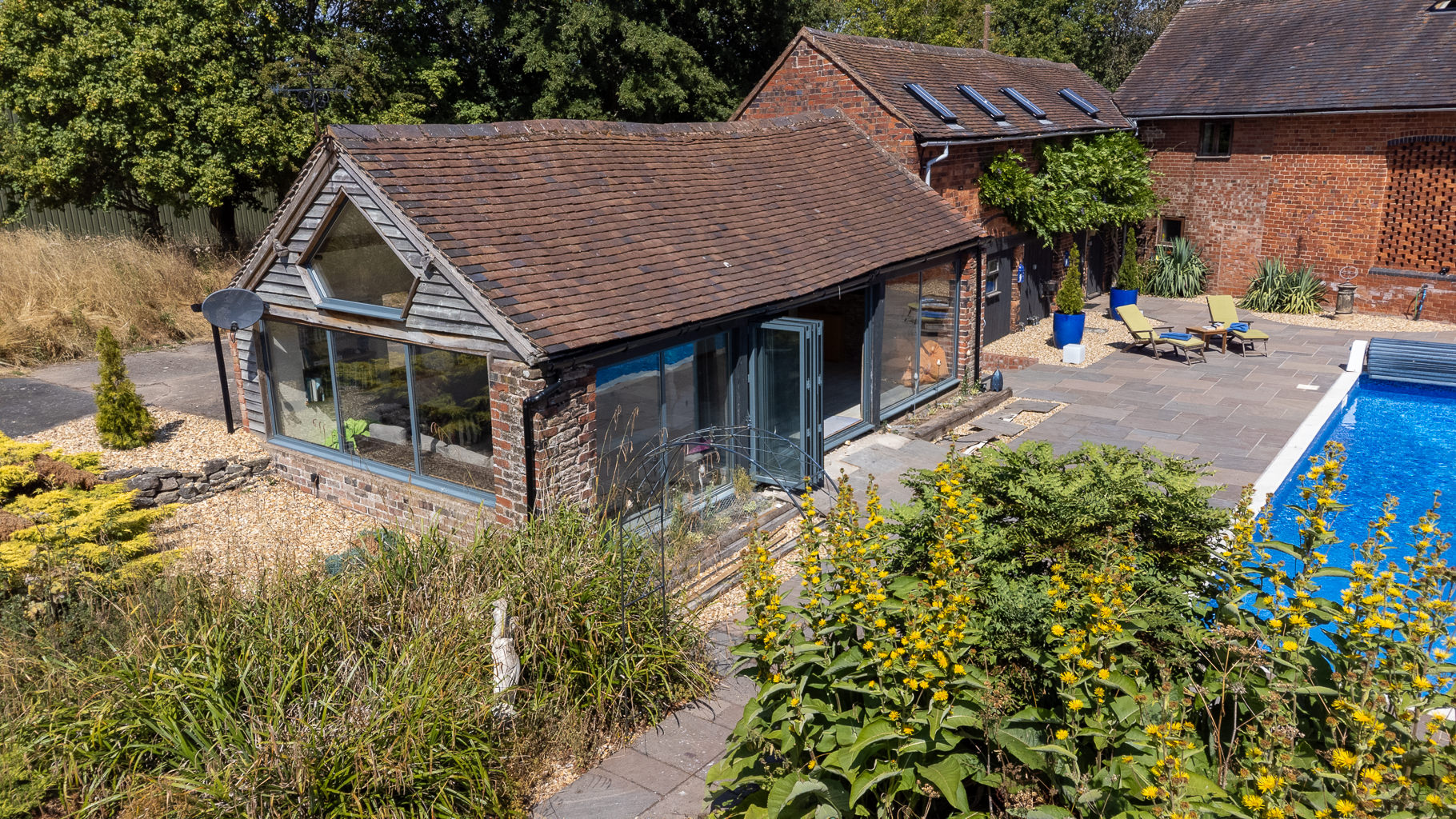 Heated outdoor pool and loggia at Reaside Farm