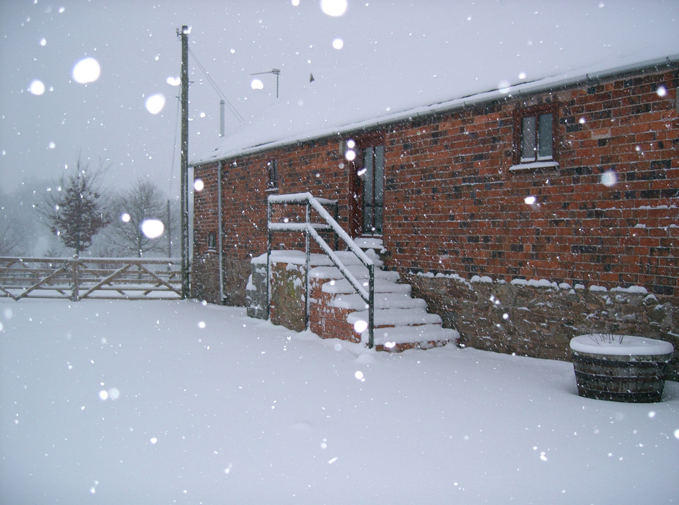 The Hayloft cottage exterior in the snow